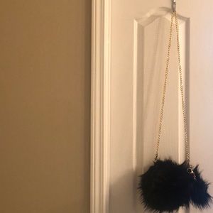 Black furry purse